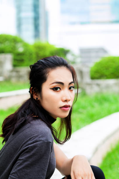 istock Transgender relaxing in Benchakitti Park 695634010