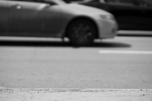 istock Horizontal black and white city road background 695635586