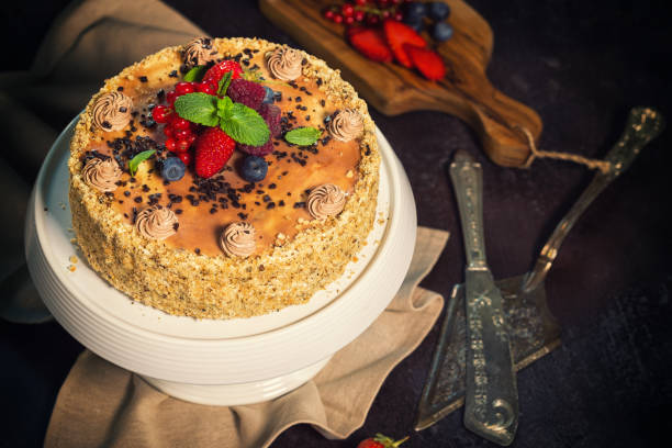 istock Chocolate Caramel Cake With Fresh Berry Fruits 695636268