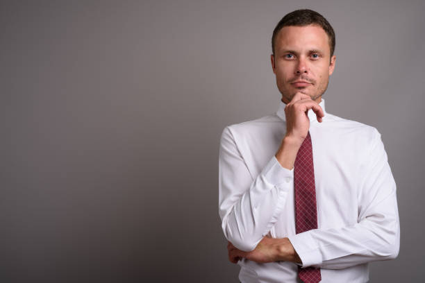 istock Studio shot of businessman against gray background 695644268