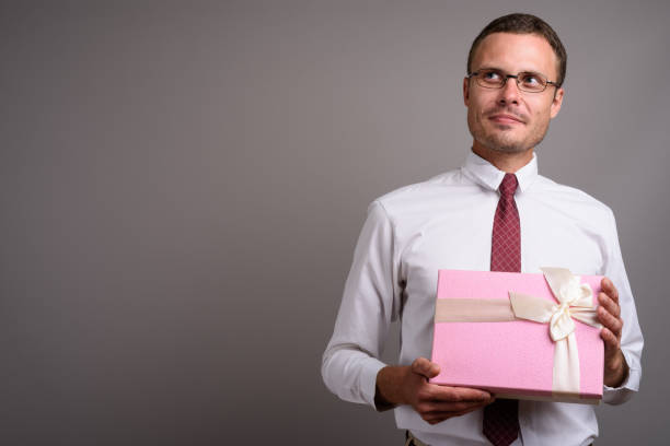 istock Studio shot of businessman against gray background 695644862