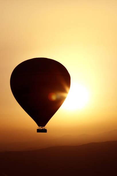 istock Balloons at sunrise. Backlight. Turkey. Cappadocia. 695645764