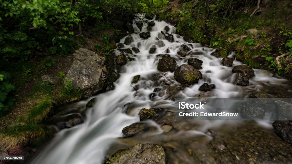 Falls Creek Falls, Alaska. Image of Falls Creek Falls along the Old Seward Highway south of Anchorage, Alaska. Alaska - US State Stock Photo