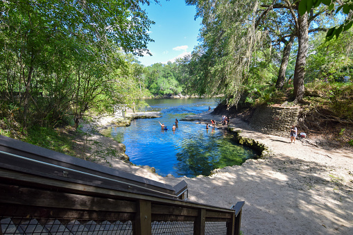 Mayo, Florida, USA - May 7, 2017: A staircase descends to the swimming hole at Layfayette Blue Springs State Park.