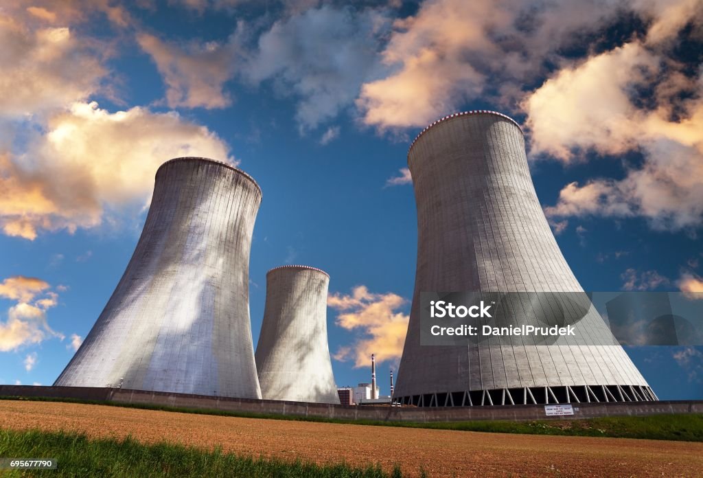 Evening colored view of cooling tower - Nuclear power Evening colored view of cooling tower - Nuclear power plant Nuclear Power Station Stock Photo