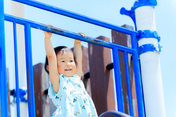 istock Cute children playing in the playground 695682032