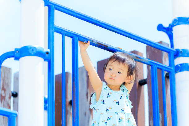 istock Cute children playing in the playground 695682216