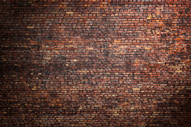 istock brick wall street background for design, texture of old brickwork 695682370