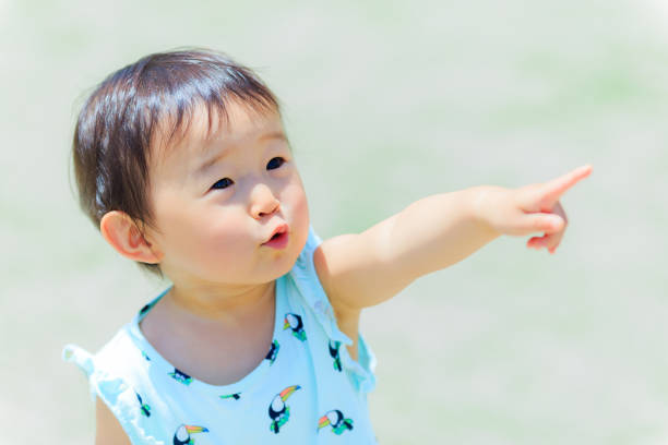 istock Cute child playing outdoors 695682492