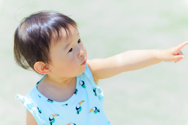 istock Cute child playing outdoors 695684734