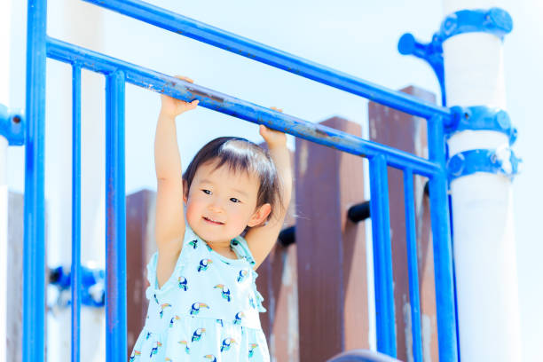 istock Cute children playing in the playground 695684982