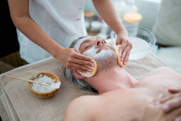 Man getting a facial at the spa
