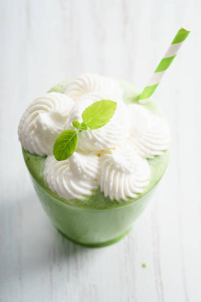 istock Freshly blended green smoothie in glass 695686204