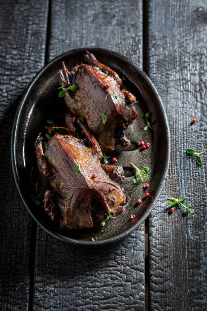 istock Homemade doves with pepper and spices on dark background 695698936