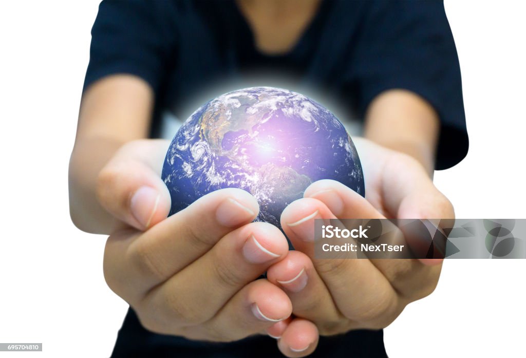 Earth planet in female hand isolated on white Earth planet in female hand isolated on white - Elements of this image furnished by NASA Business Stock Photo