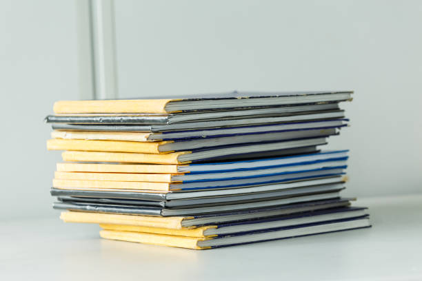 istock Many old books in a pile 695707464