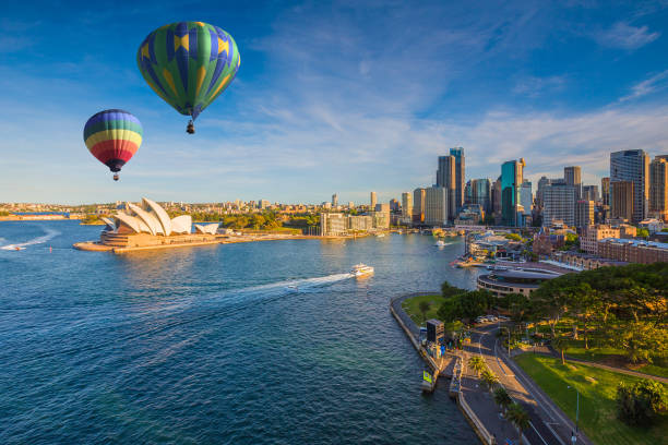 Hot air balloon over Sydney bay in evening, Sydney, Australia stock photo