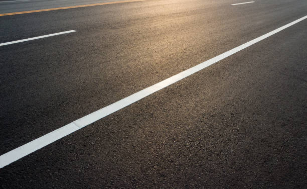 istock Road markings on asphalt 695740998