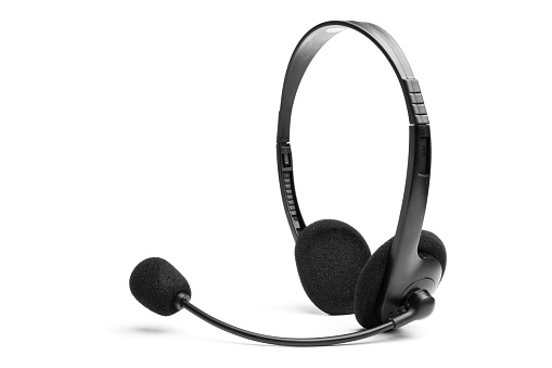 Black headphones on white background used in call center