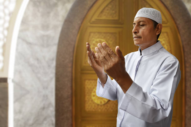 istock Old muslim man praying in mosque 695750498