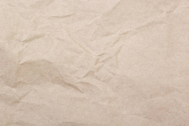 Crumpled brown paper texture stock photo