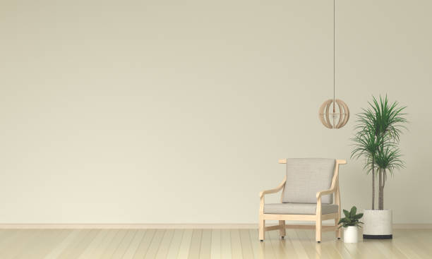 istock gray armchair with plant and lamp on empty wall background,art works,3D rendering 695759520