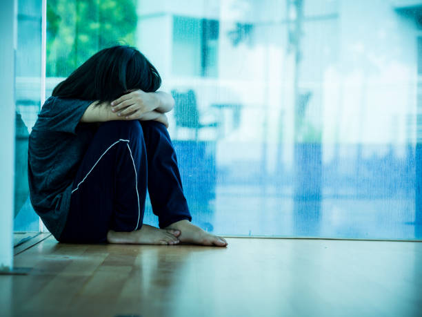 istock little boy unhappy sad and tress alone 695759668