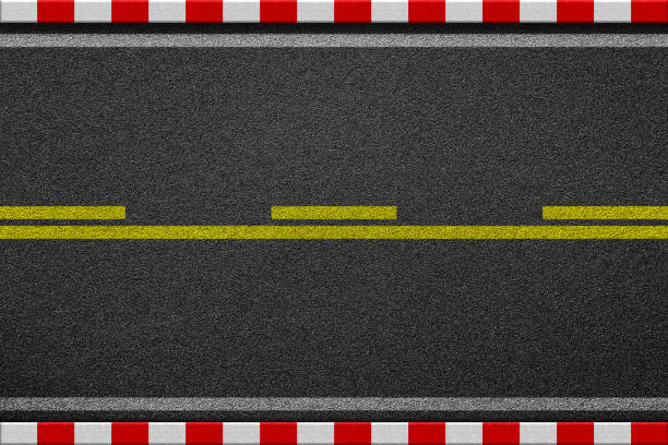 istock White line marking sign on black asphalt road. Red and white lin 695760054