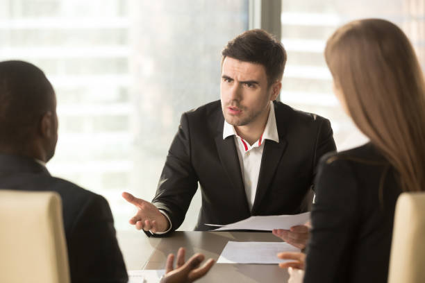 istock Angry boss dissatisfied with bad result, partners arguing about contract 695760154