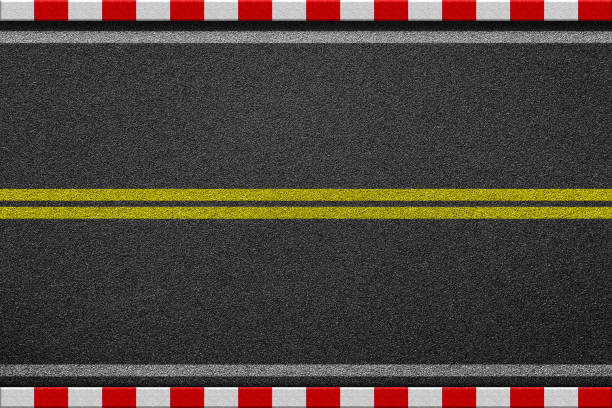 istock White line marking sign on black asphalt road. Red and white lin 695760230