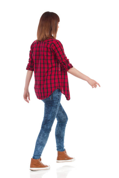 istock Casual Girl Is Walking Rear View 695766772