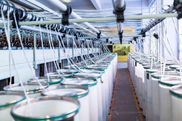 Thread making machine inside cotton mill stock photo