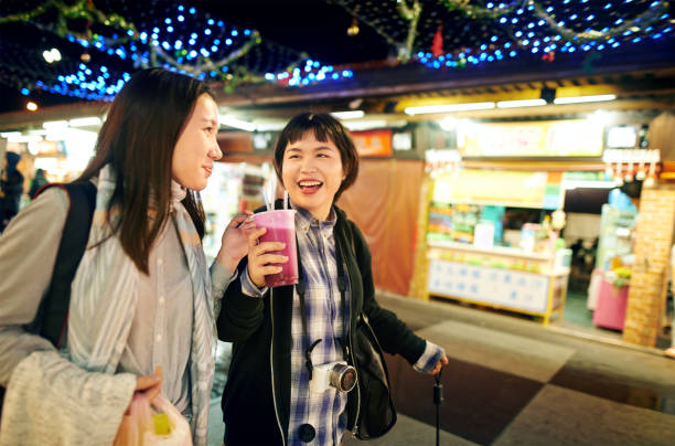 istock Who better to share the night market experience with 695769758