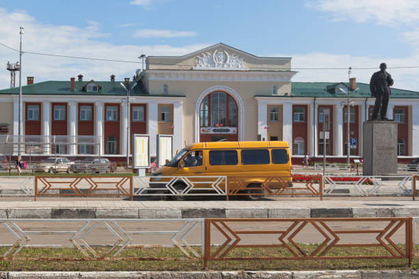A fixed-route taxi at the station square of the Kotlas Yuzhny railway station in the Arkhangelsk Region Kotlas, Arkhangelsk region, Russia - August 12, 2016: A fixed-route taxi at the station square of the Kotlas Yuzhny railway station in the Arkhangelsk Region kotlas stock pictures, royalty-free photos & images