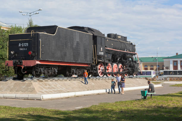 Steam locomotive on the station square in Kotlas, Arkhangelsk region Kotlas, Arkhangelsk region, Russia - August 12, 2016: Steam locomotive on the station square in Kotlas, Arkhangelsk region kotlas stock pictures, royalty-free photos & images