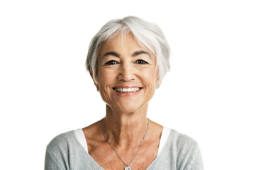 Studio portrait of a senior woman posing against a white background