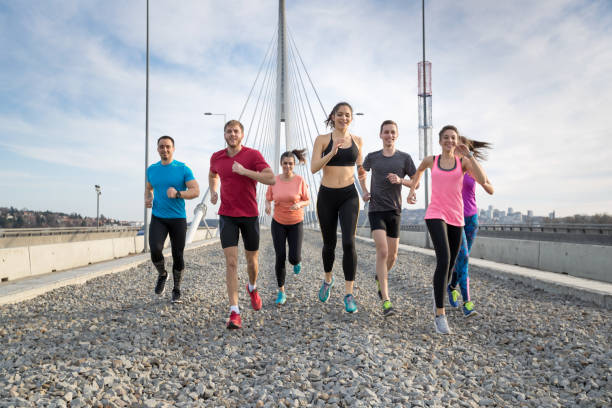 istock Friends racing each other 695790300