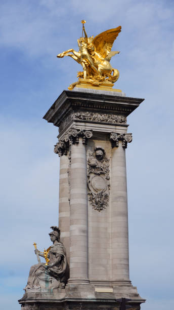 istock Photo from iconic Alexander III bridge the most beutiful in Paris on a spring morning, River Seine, France 695806782