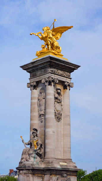 istock Photo from iconic Alexander III bridge the most beutiful in Paris on a spring morning, River Seine, France 695806830