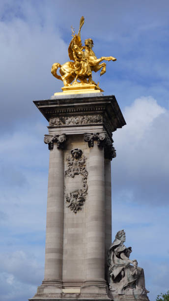 istock Photo from iconic Alexander III bridge the most beutiful in Paris on a spring morning, River Seine, France 695806908