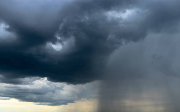istock Dark clouds and falling rain. Northern Hemisphere. Eastern Europe 695806972
