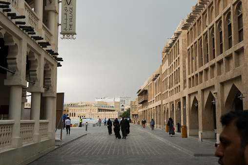 Morning scene on a cool February morning in the popular pedestrian area of Souk Waqif in Doha, Qatar.