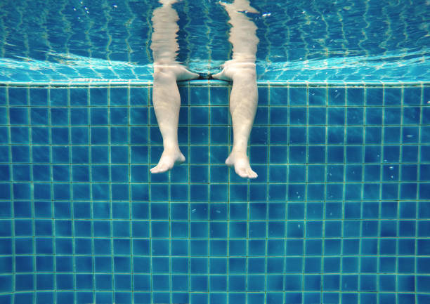 istock Relax underwater in swimming pool, summertime 695807216