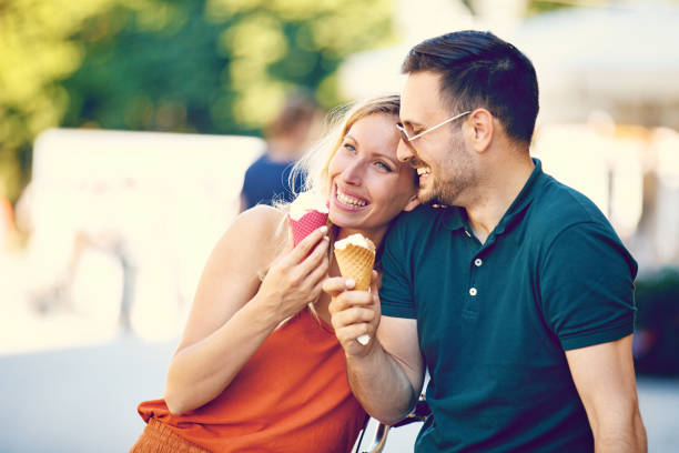 istock Happy Couple Eating Ice-Cream 695813594