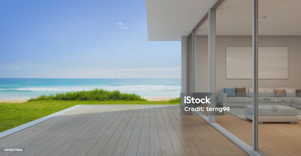 Sea view Living room with empty terrace in modern luxury beach house, Vacation home for big family 3d rendering of building and terrace Building Terrace Stock Photo