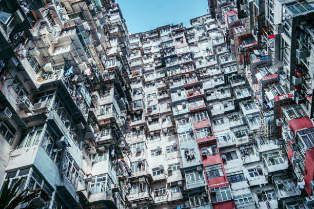 istock Crowded apartment building in Hong Kong, China 695828636