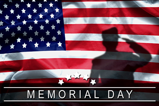 Happy Memorial Day greeting card, National american holiday. Memorial day background remember and honor , shadow of soldier on american flag with word Memorial day.