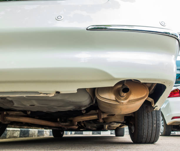 istock exhaust pipe of a white car 695828892