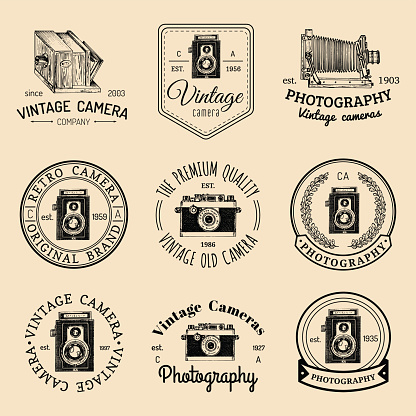 Vector set of old cameras icons. Vintage photo studio, salon signs, labels or badges