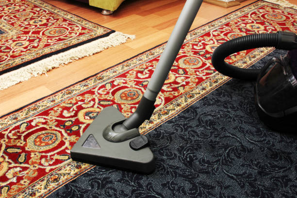 istock House cleaning with vacuum cleaner 695839480